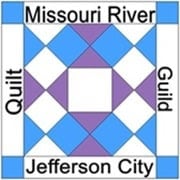 MRQG Logo A quilt block design with blue, white, and purple geometric shapes. Text reads “Missouri River Quilt Guild Jefferson City” around the square.