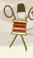 A playful figure made from sewing items: scissors as arms, a spool of thread as the body, pins as legs, and a thimble as the head, arranged to look like a person.