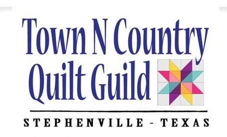 Logo reading Town N Country Quilt Guild with a colorful patchwork quilt star and Stephenville - Texas below in black letters.